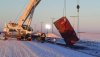 crane-moves-damaged-uranium-container-at-swift-current-sask.jpg